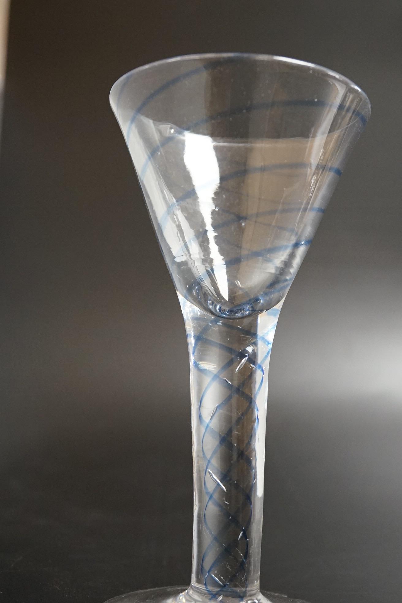 Two drawn wine glasses, each with air-tear stems, and a drawn-stem wine glass with blue internal twist, tallest 17cm high (3)